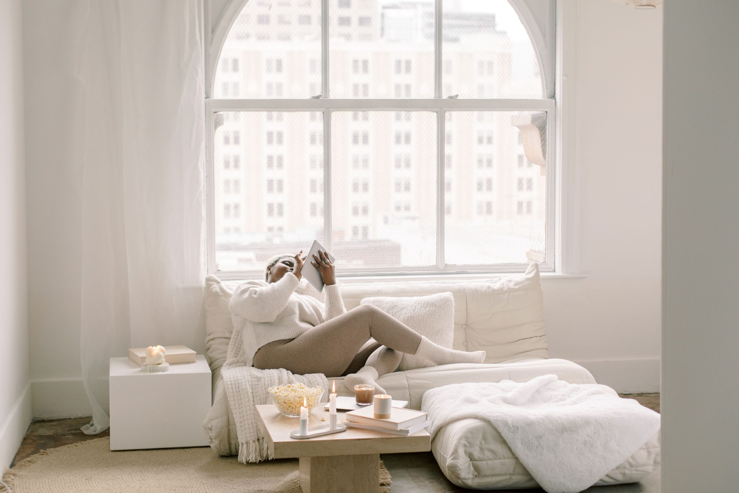 Woman on couch having a mental health day